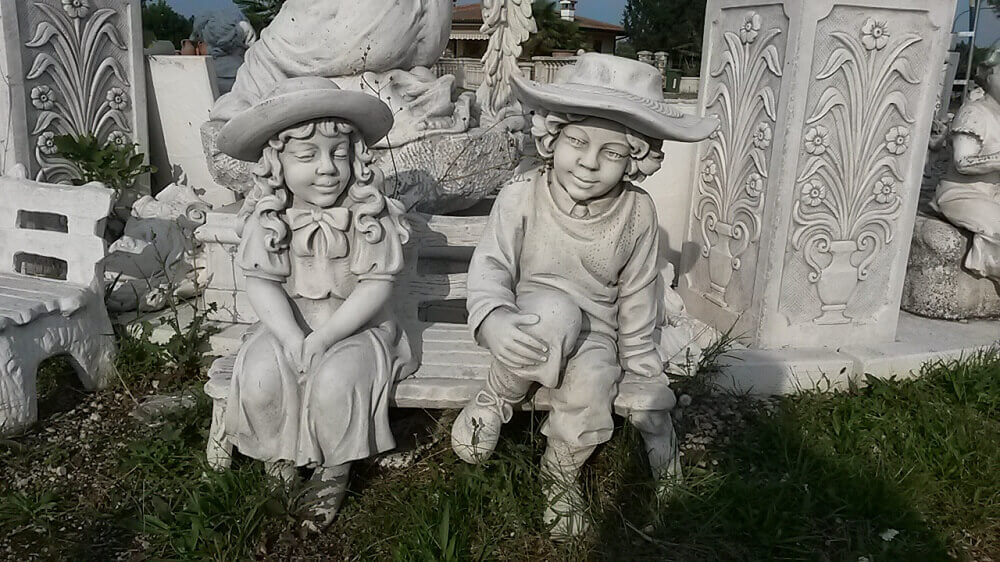 GIARDINO Statue Coppia bimbi su panca PU3125